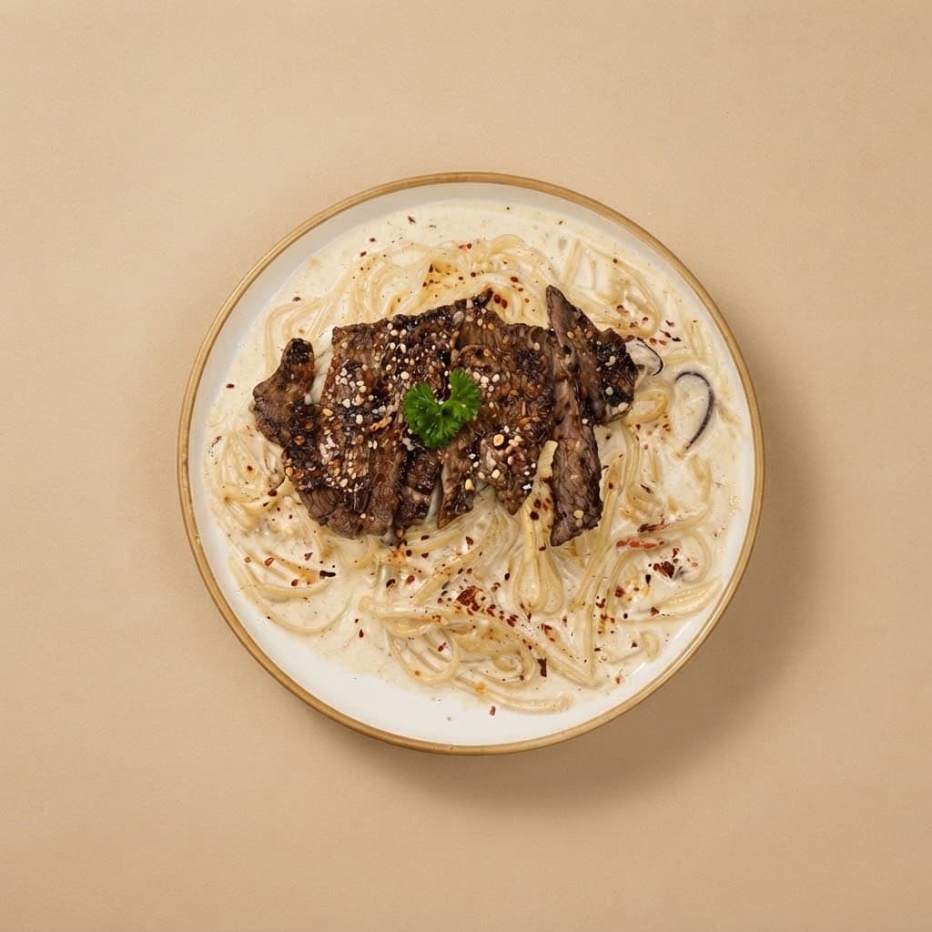 Creamy Chili Pasta with Striploin Steak served at The Roadside Eatery